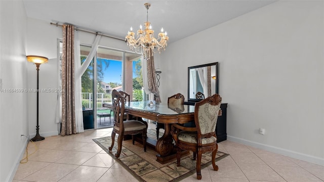 tiled dining space featuring an inviting chandelier