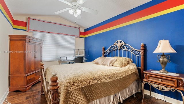 bedroom featuring ceiling fan, dark hardwood / wood-style floors, and vaulted ceiling