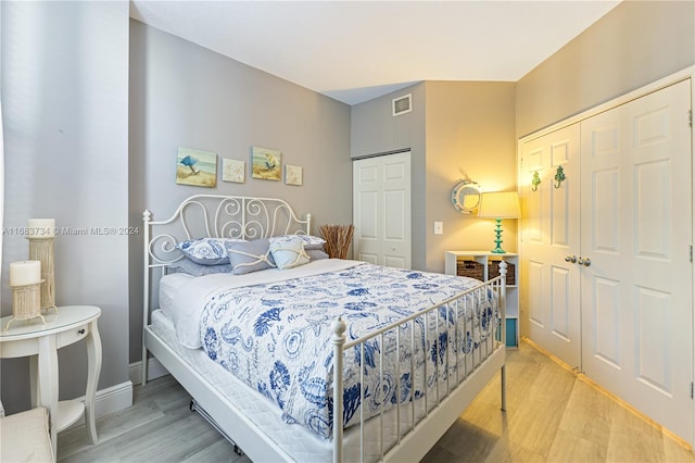 bedroom featuring hardwood / wood-style floors