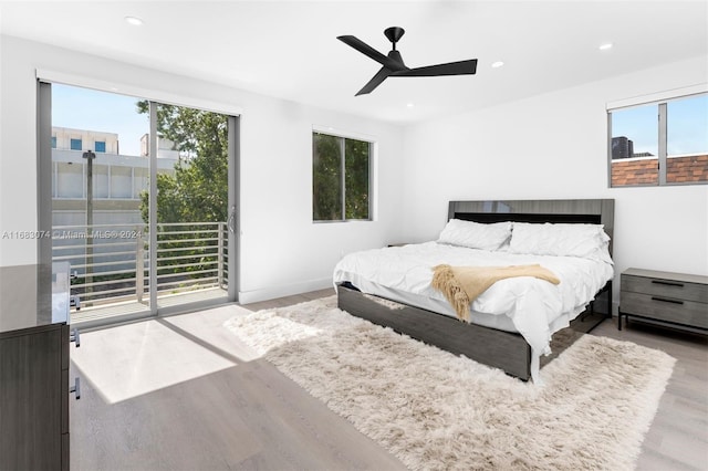 bedroom with wood-type flooring and ceiling fan