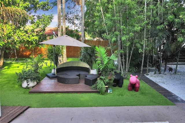 view of yard featuring an outdoor living space and a deck