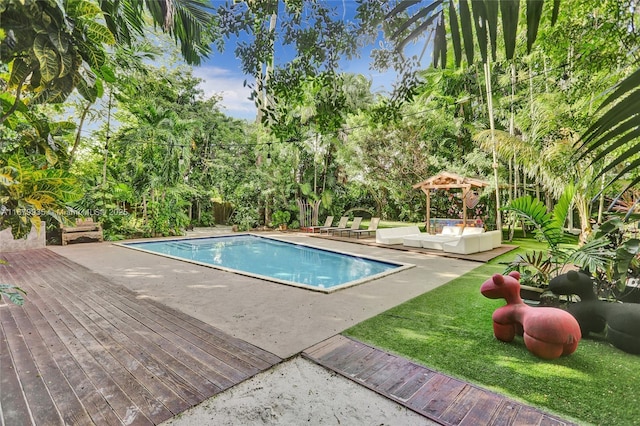 view of pool featuring a wooden deck