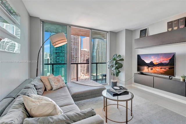 living room with tile patterned floors and a wealth of natural light