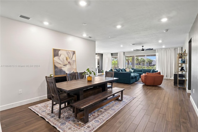 dining area featuring dark hardwood / wood-style floors and ceiling fan