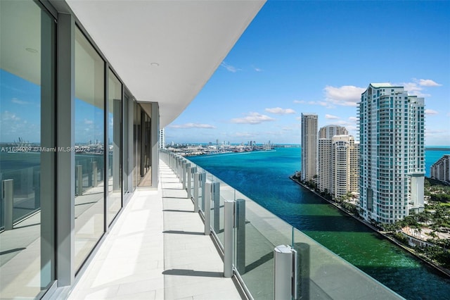 balcony featuring a water view