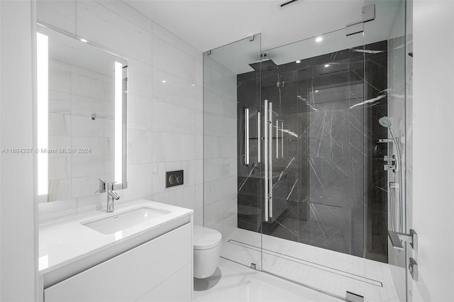 bathroom with vanity, an enclosed shower, toilet, and tile walls