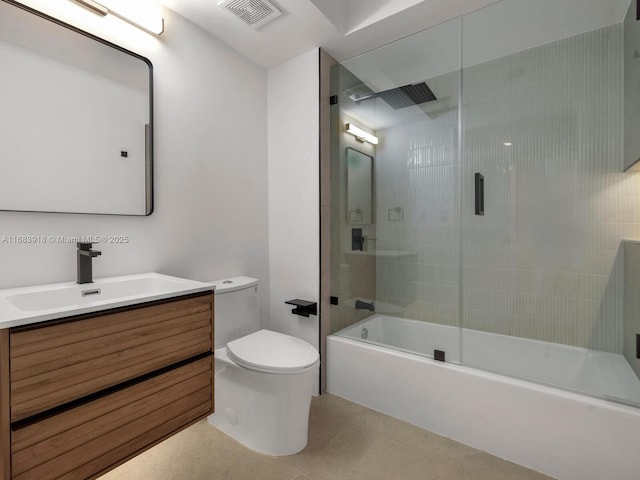 full bath featuring toilet, vanity, bath / shower combo with glass door, and visible vents