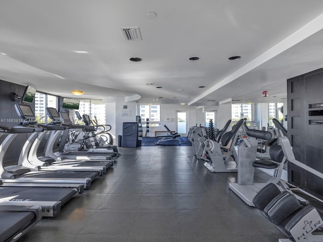 workout area featuring visible vents and recessed lighting