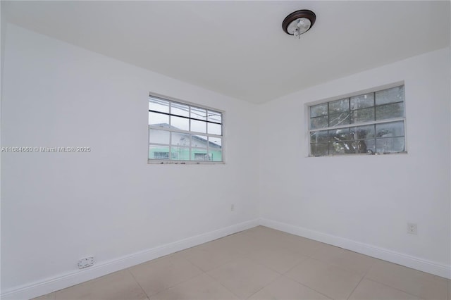 view of tiled spare room