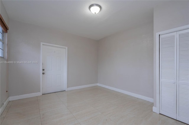 unfurnished bedroom featuring a closet