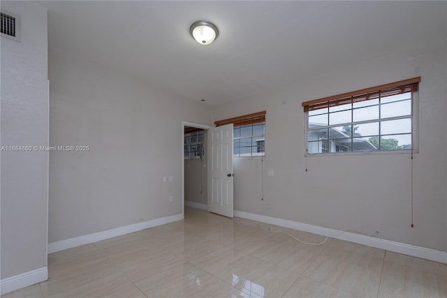 view of tiled spare room