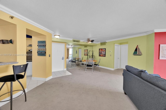 living room with light carpet, crown molding, a textured ceiling, and ceiling fan