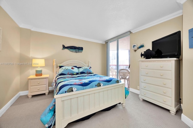 carpeted bedroom featuring ornamental molding