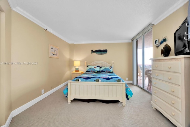 carpeted bedroom with crown molding