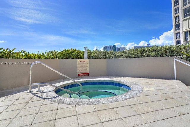 6767 Collins Ave Unit 706, Miami Beach, FL 33141 - view of swimming pool with a community hot tub