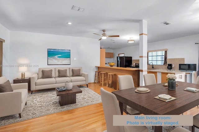 interior space featuring ceiling fan and light hardwood / wood-style floors