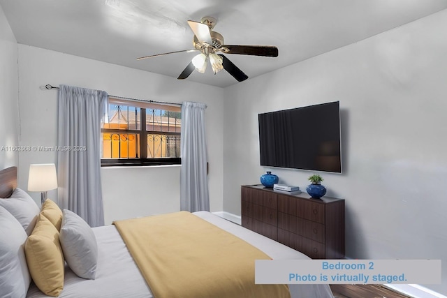 bedroom featuring ceiling fan