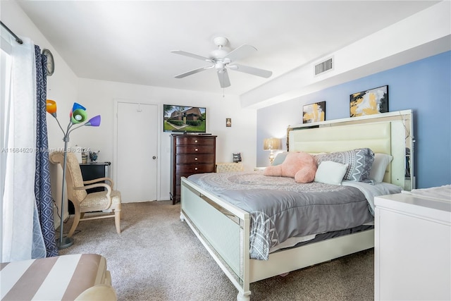 bedroom with light colored carpet and ceiling fan