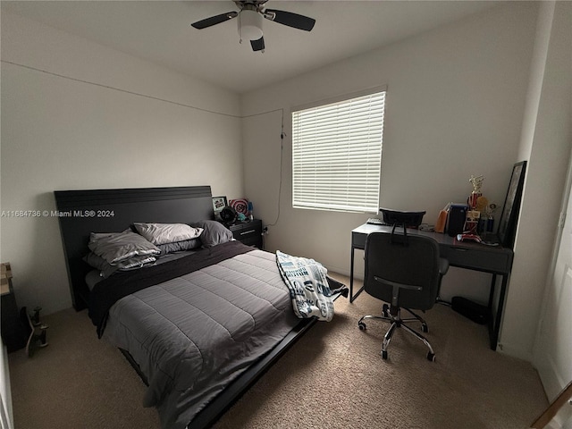 bedroom featuring light carpet and ceiling fan