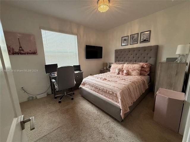 bedroom featuring carpet