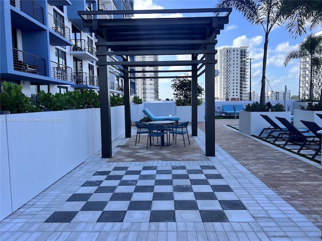 view of patio featuring a pergola