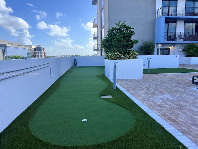 surrounding community with a patio area