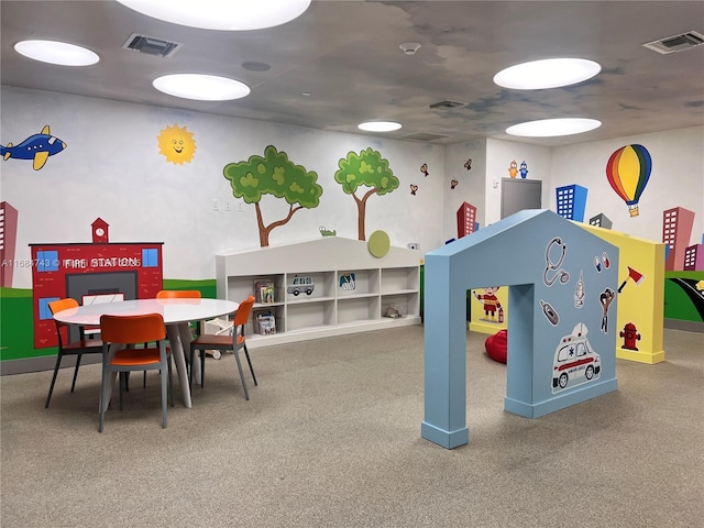 playroom featuring built in shelves