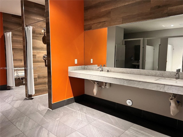 bathroom featuring dual sinks