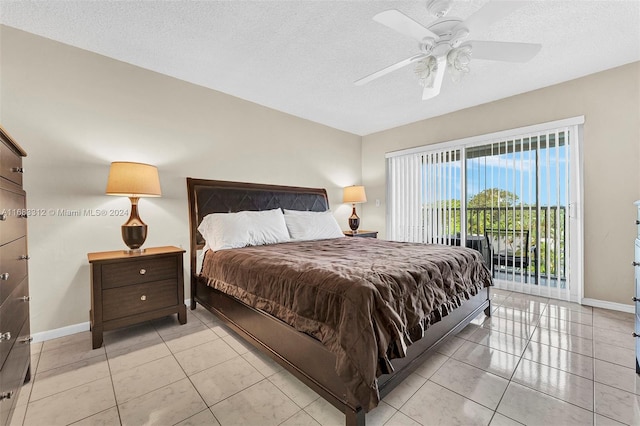 tiled bedroom with a textured ceiling, access to exterior, and ceiling fan