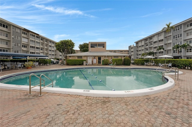 view of pool featuring a patio area