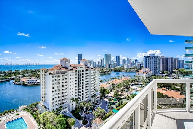 balcony featuring a water view