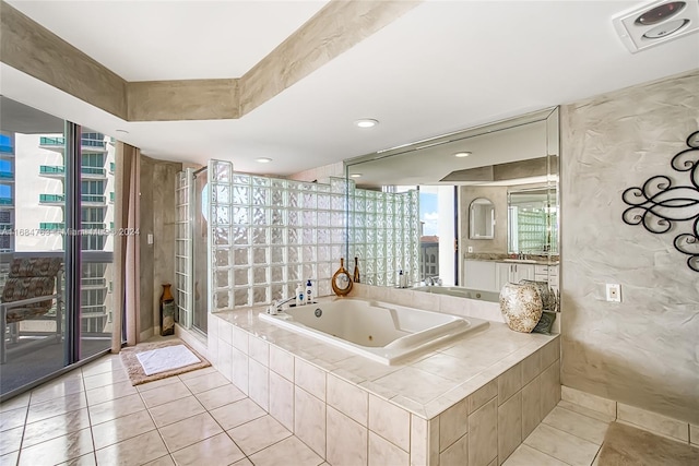 bathroom with plus walk in shower and tile patterned floors