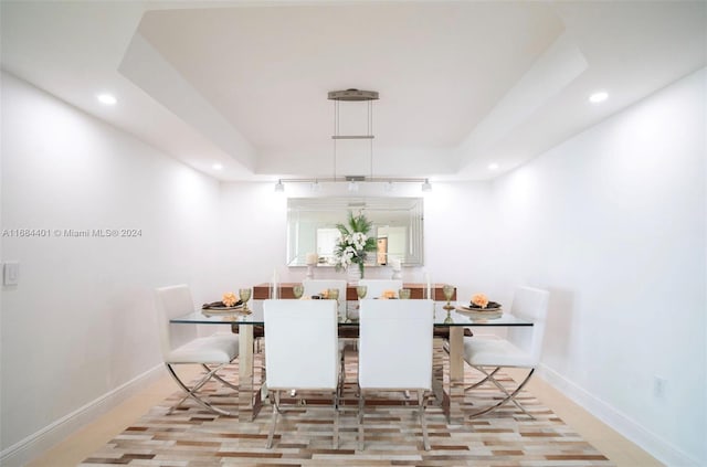 dining space featuring light wood-type flooring