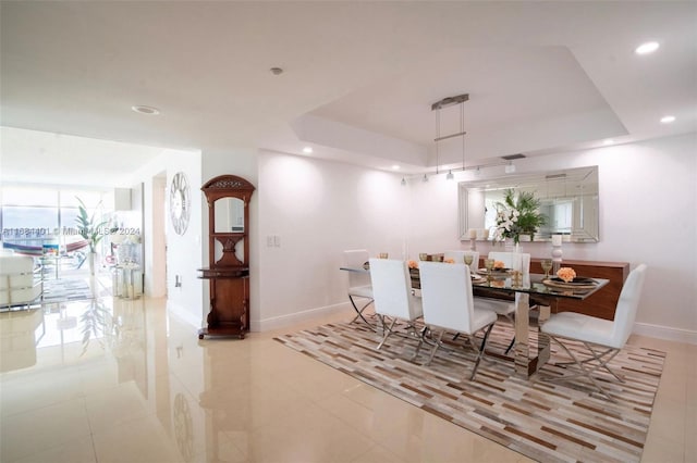 16400 Collins Ave Unit 1444, Sunny Isles Beach, FL 33160 - tiled dining room featuring recessed lighting and a tray ceiling