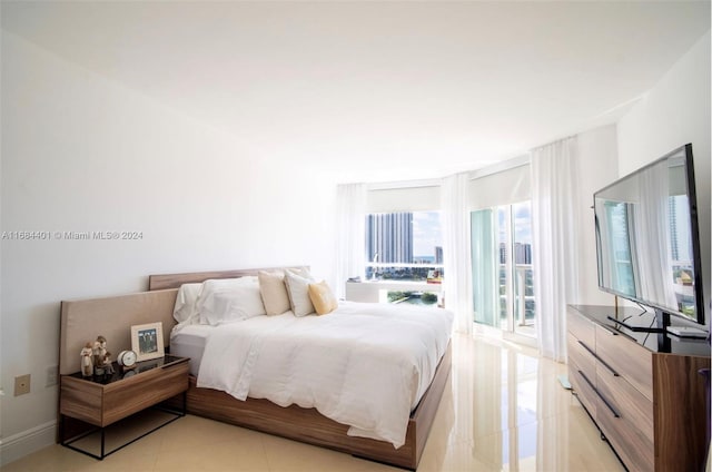 16400 Collins Ave Unit 1444, Sunny Isles Beach, FL 33160 - bedroom with light tile patterned floors
