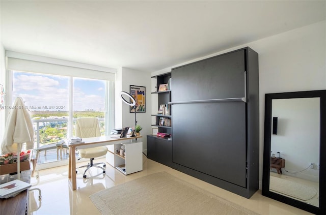 home office featuring light tile patterned floors