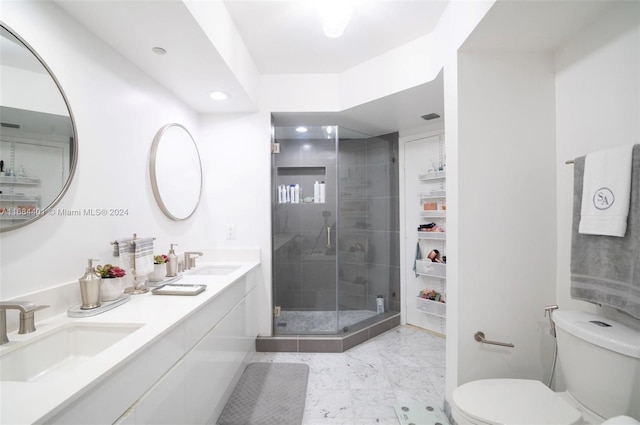 bathroom with vanity, toilet, and walk in shower