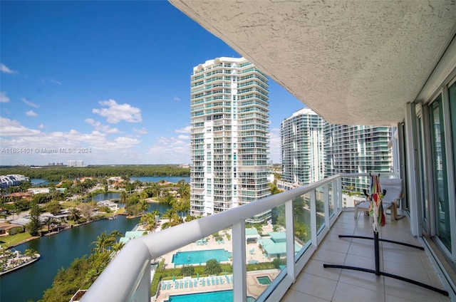 balcony featuring a water view