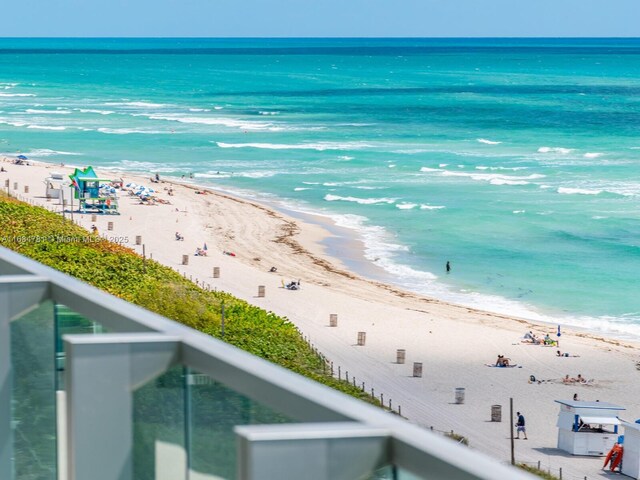 property view of water featuring a beach view