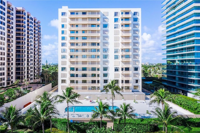 view of property featuring a community pool