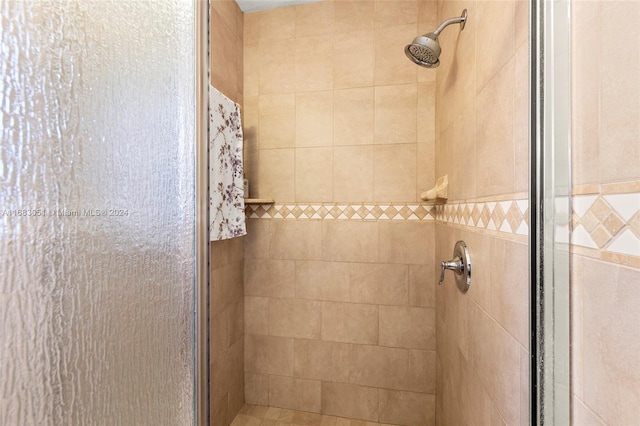 bathroom with an enclosed shower