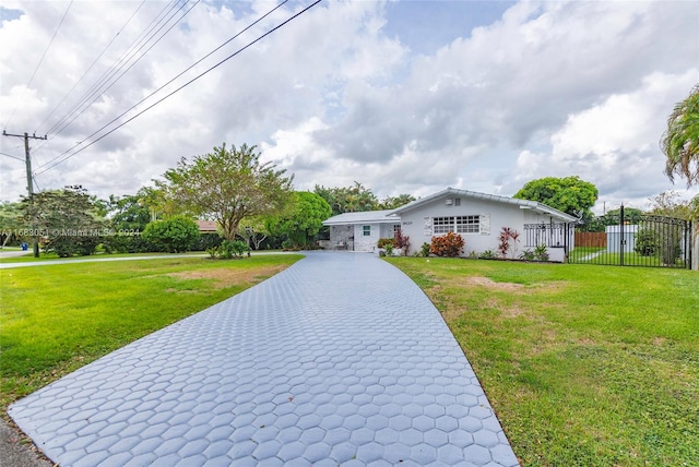 view of front of property with a front lawn