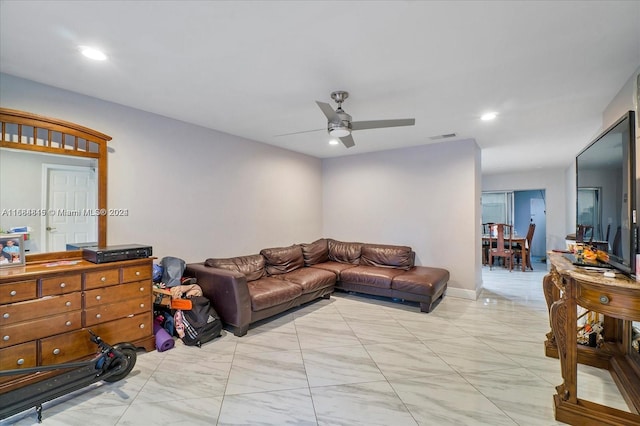 living room featuring ceiling fan