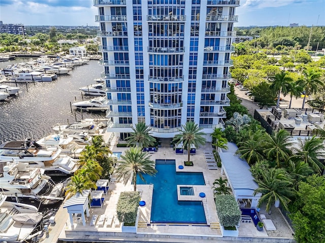 birds eye view of property featuring a water view