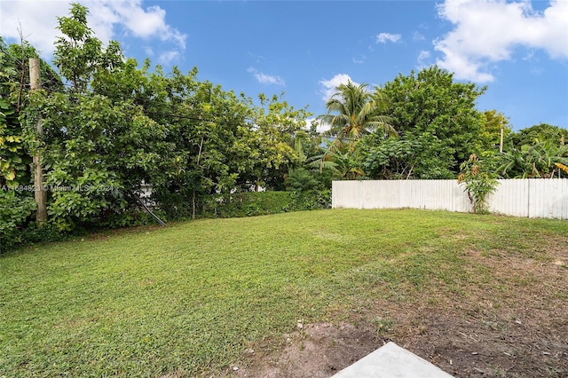 view of yard with fence