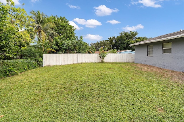 view of yard with fence