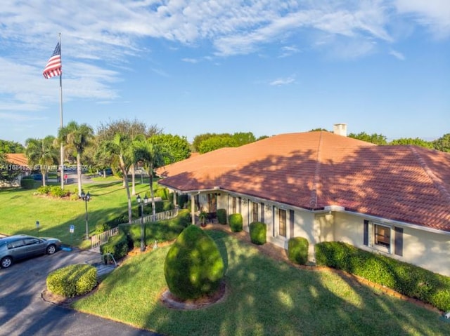 view of front of home with a front yard