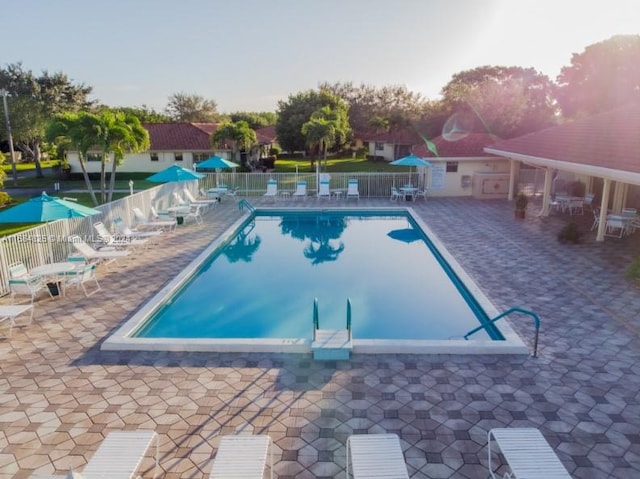 view of swimming pool featuring a patio