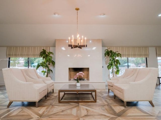 interior space featuring an inviting chandelier, light parquet flooring, and plenty of natural light