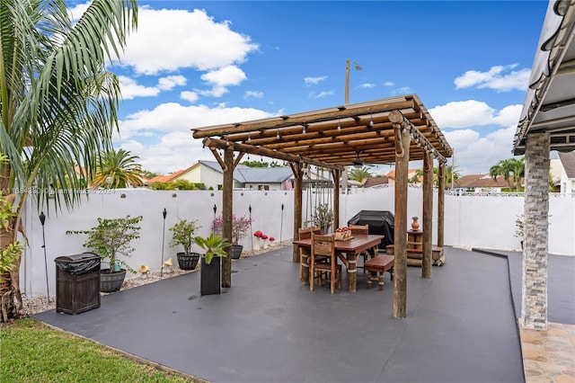 view of patio with a pergola and grilling area